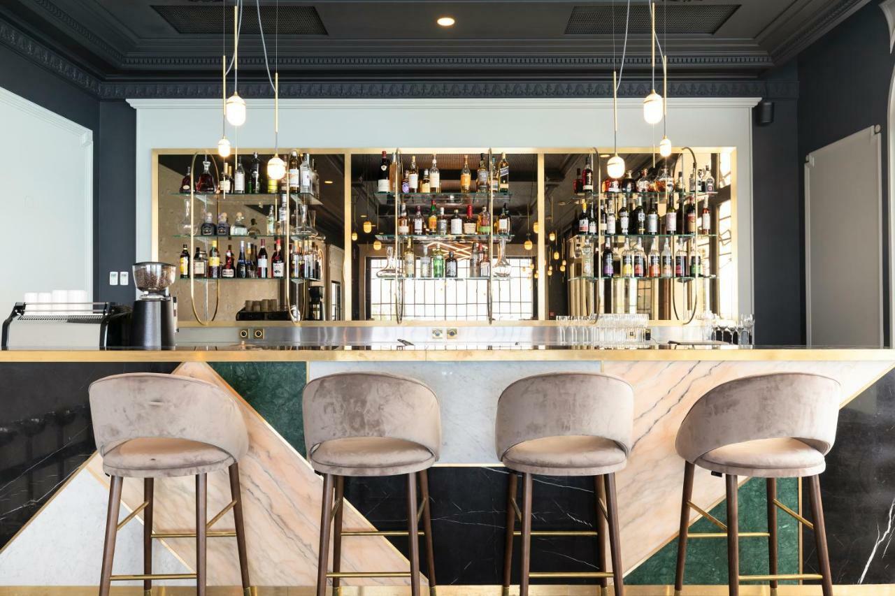 Le Palace De Menthon Exterior foto The bar at the 2018 edition of the World Economic Forum