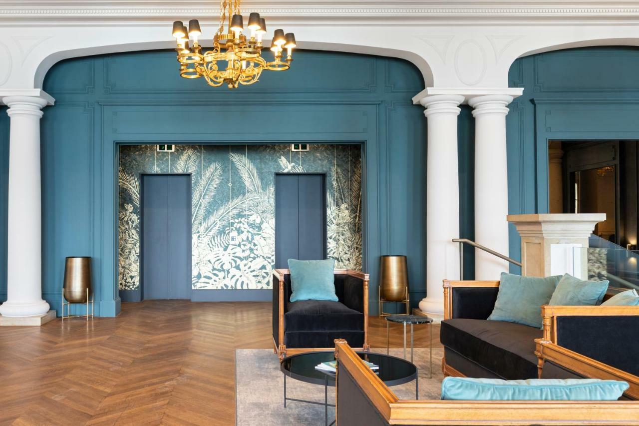 Le Palace De Menthon Exterior foto The lobby of the hotel